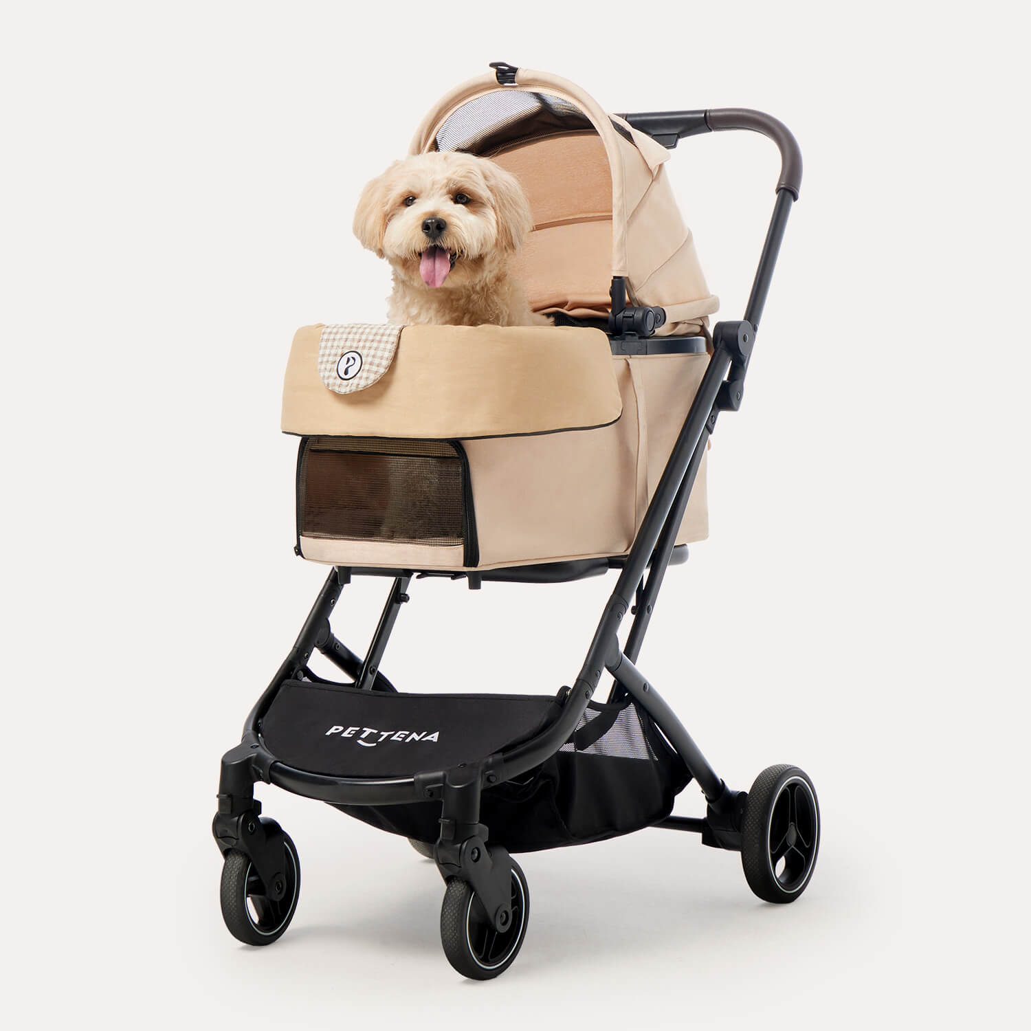 PETTENA 折りたたみ式分離型あごのせクッション付きペットカートORIONに犬を乗せる様子