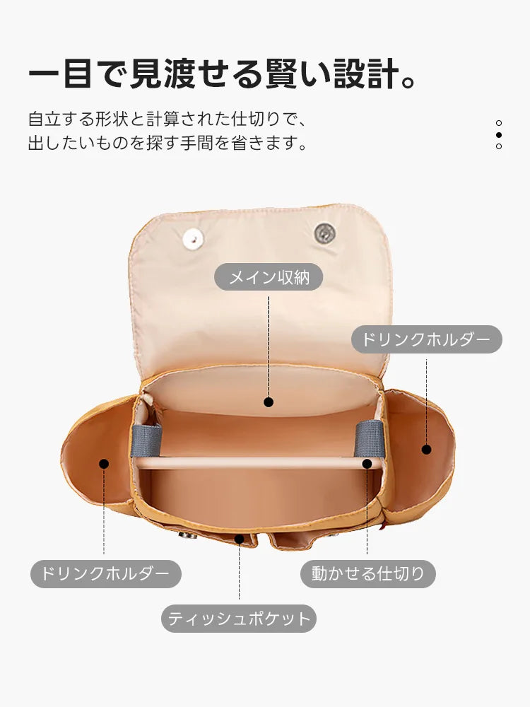 2WAY防水カートバッグを真上から見た内部レイアウト。メイン収納を中心に、両サイドのドリンクホルダー、可動式の仕切り、ティッシュ用ポケットを完備。マスタード色の本体に計算された賢い設計が確認できます。
